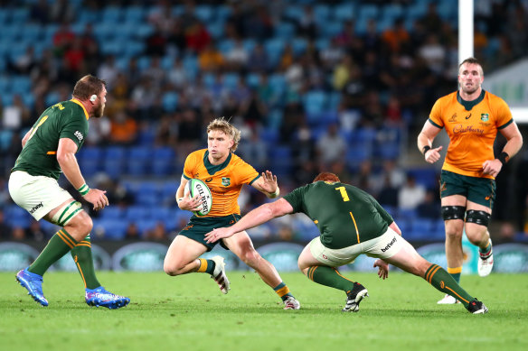 Tate McDermott stepping in attack against the Springboks on the Gold Coast.