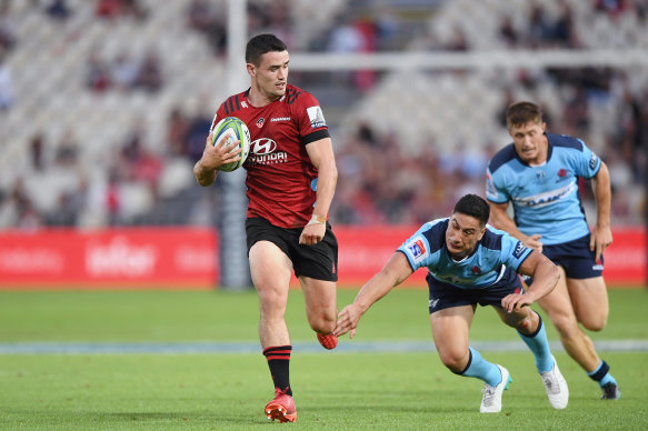 Runaway score: The Crusaders' Will Jordan breaks the defensive line.