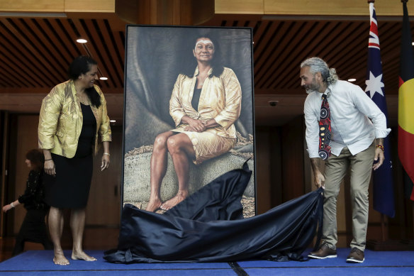 Aboriginal artist Dr Jandamarra Cadd unveils his official portrait of former Senator Nova Peris.