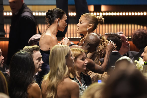 Demi Moore (left) chats with Ariana Grande at the Critics Choice Awards in Los Angeles.