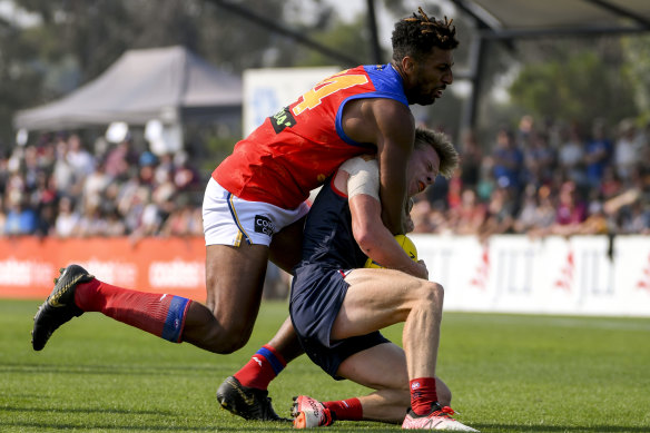 Archie Smith, pictured tackling Charlie Spargo, is of interest to Brisbane and Sydney. 