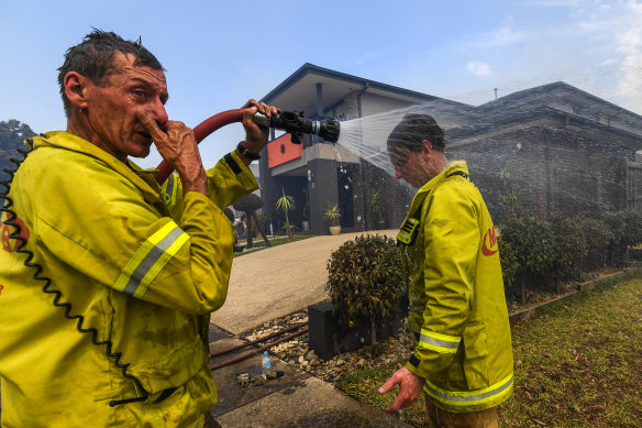 An MFB fireman cools down. 