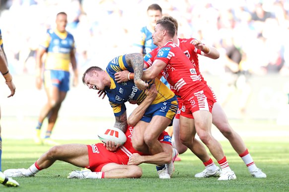 Dragons forward Ryan Couchman was sin-binned for this hip-drop tackle on J’Maine Hopgood.