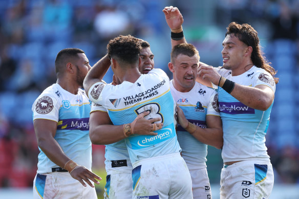 Titans teammates celebrate David Fifita’s try.