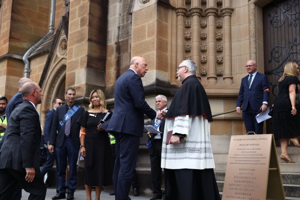 Opposition Leader Peter Dutton arriving at the mass for the late cardinal George Pell. 