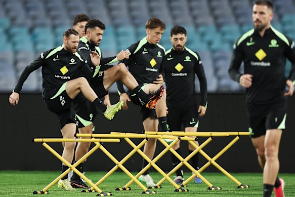 Martin Boyle (right) and his fellow Socceroos train at Stadium Australia on Thursday.
