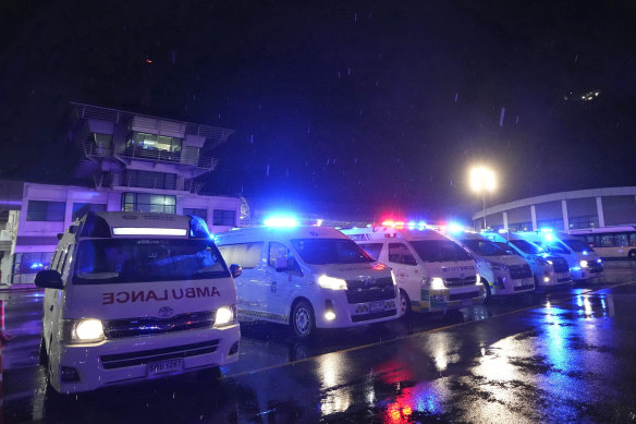 Ambulances wait to carry passengers from a London-Singapore flight that encountered severe turbulence.