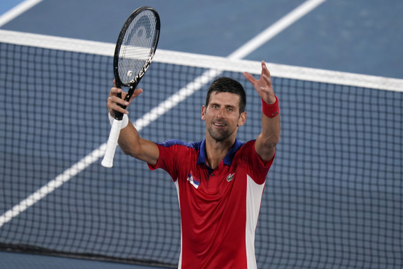Novak Djokovic celebrates his win over Kei Nishikori.