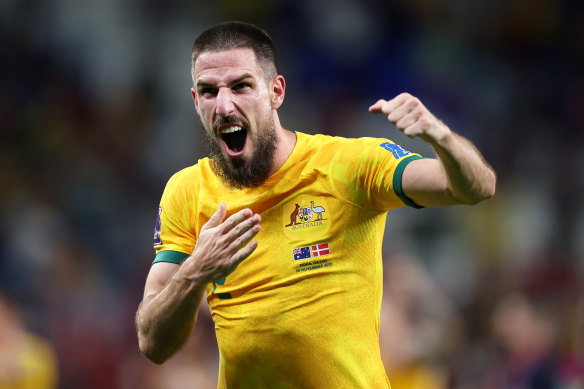 Milos Degenek celebrates Australia’s victory over Denmark to reach the round of 16 at the World Cup.