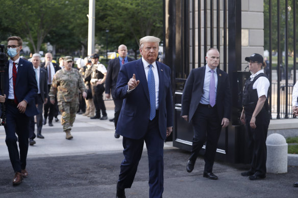 US President Donald Trump returns to the White House after the photo-op outside St John's Church.