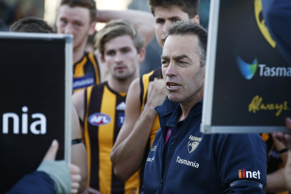 Alastair Clarkson with his players on Saturday.