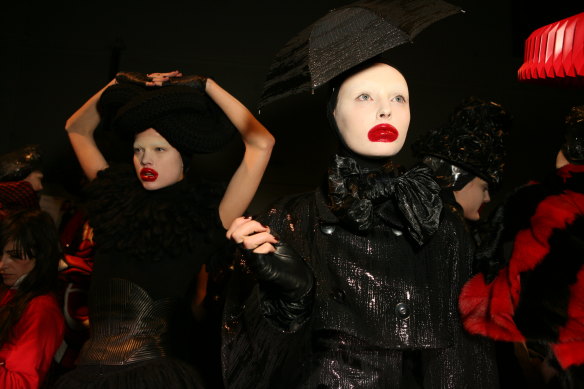 Models backstage at Alexander McQueen’s autumn 2009 show inspired by club kid Leigh Bowery.