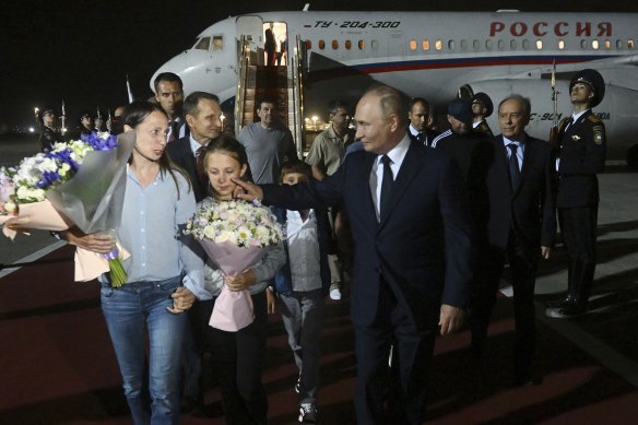 Vladimir Putin meets released Russian prisoners and their relatives arriving at Vnukovo airport, Moscow.