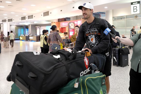 Mitchell Starc arrives home in Sydney on Sunday after the IPL was postponed.