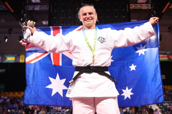 Gold medallist Aoife Coughlan of Australia celebrates during the Women’s Judo -70kg medal ceremony on day five.