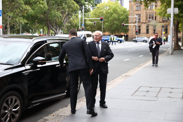 Former prime minister John Howard arriving for George Pell’s Sydney funeral. 