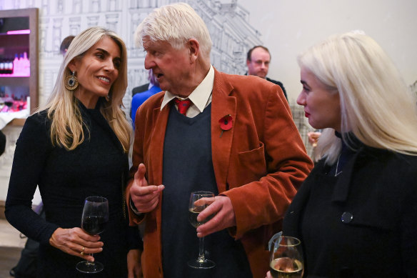 Cristina Talacko speaks with former European Parliament MP Stanley Johnson during an event at the Glasgow climate talks in 2021.