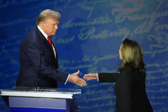 Donald Trump and Vice President Kamala Harris shake hands at the beginning of the debate.