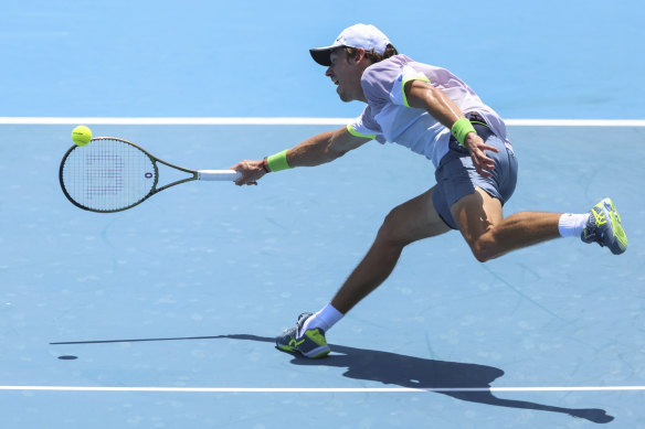 Alex de Minaur on the move against Andy Murray at the Kooyong Classic on Thursday.