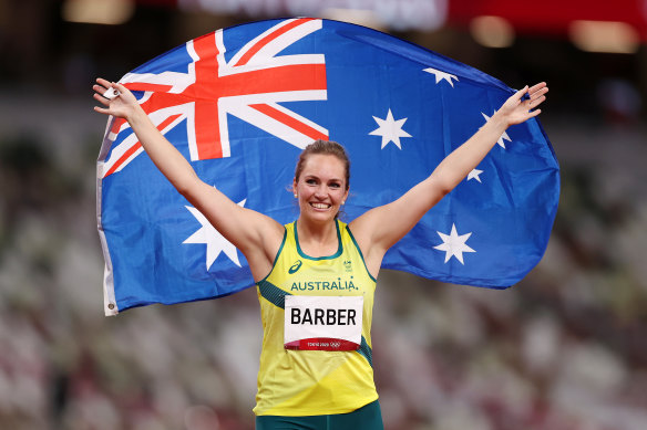 Kelsey-Lee Barber celebrates her bronze medal in the javelin.