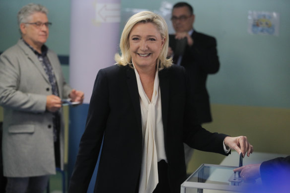 French presidential candidate Marine Le Pen casts her vote before her third election loss.