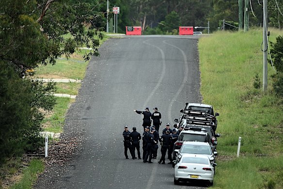 Police search an area at Glenorie.