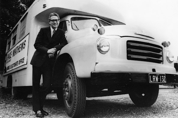 Race Mathews in 1974 standing next to his mobile electorate office.