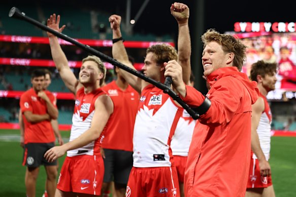 Callum Mills was on crutches after injuring his knee in the Swans’ win.