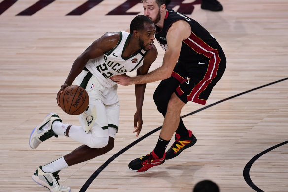 Khris Middleton had 21 of his 36 points in the third quarter before launching a crucial three in overtime.