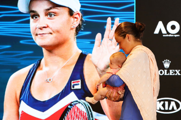 Ashleigh Barty enters the post-match press conference with niece Olivia.