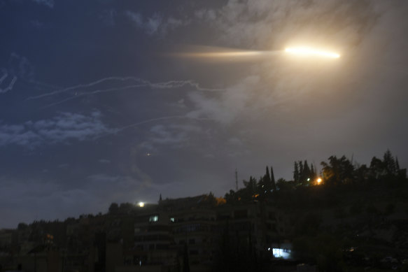 Israeli missiles fly in near the international airport in Damascus in Syria last year. Syria has again intercepted missiles it says were fired by Israel.