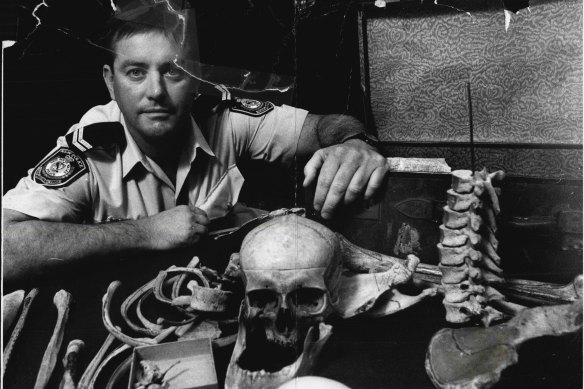 Senior Constable Peter Kelly with the collection of bones that were discovered in a suitcase at St Mary’s Cathedral in 1993.