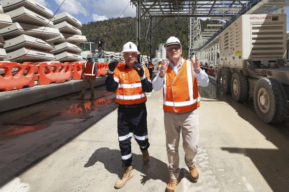 Former Snowy Hydro CEO Paul Broad and former Prime Minister Scott Morrison on a tour of the Snowy Hydro Lobs Hole site, during their visit for the commissioning of a second tunnel boring machine, on Friday 3 December 2021
