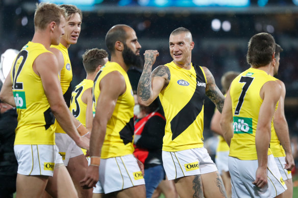 Jubilation: The Tigers savour the moment after earning a grand final berth.