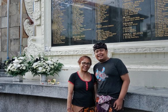 Made Bagus Aryadana, right, with his mother Ni Luh Erniati at the Bali bombings monument.
