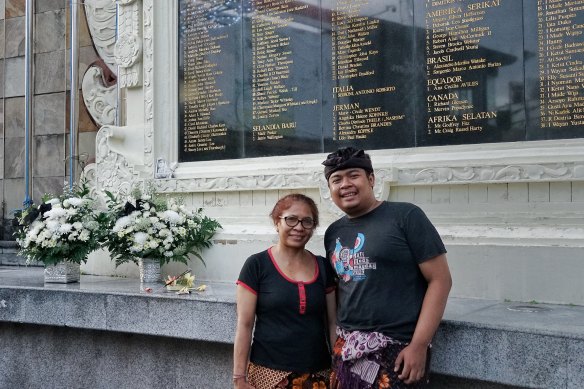 Made Bagus Aryadana, right, with his mother Ni Luh Erniati at the Bali bombings monument.