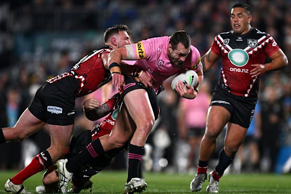 Panthers captain Isaah Yeo charges into the Warriors’ defence before injuring his pec on FRiday night.