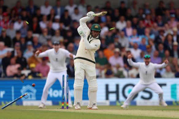 Usman Khawaja loses his leg stump to Mark Wood.