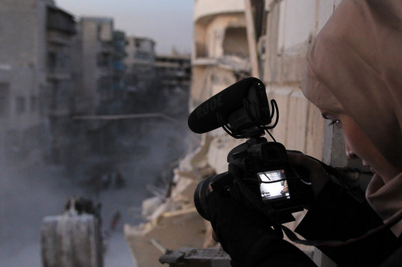 Journalist Waad al-Kateab filming the destruction in 2016.