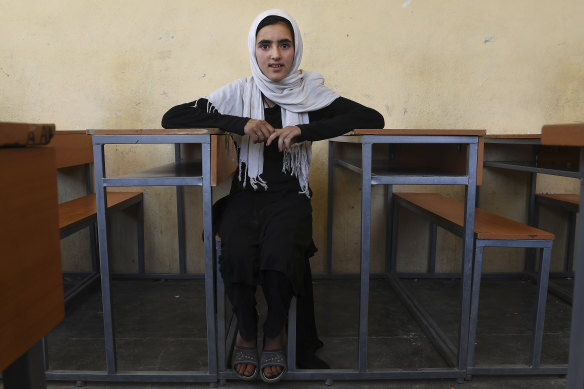 Sabzina Merzayee, 12, sits in a classroom in Shaidayee, near Herat in western Afghanistan, in June. Her family had to flee their home province of Ghor, to the east of Herat, after Sabzina's school was burnt down.