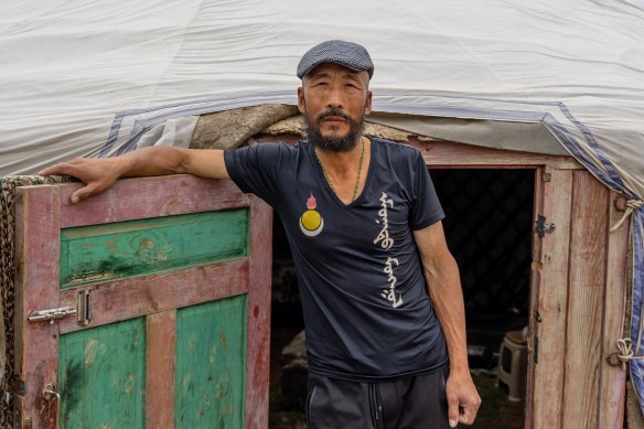 Bai outside his ger, or yurt, in Ulaanbaatar.