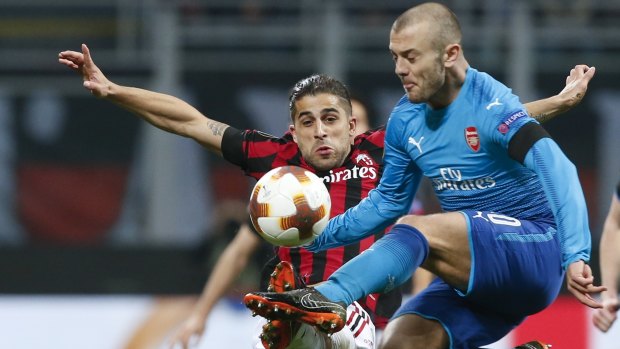 Arsenal's Jack Wilshere (right) and Milan's Ricardo Rodriguez.