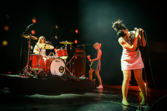 Hanna on stage with Bikini Kill at the Hollywood Palladium in 2019.