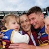 Dayne Zorko celebrates the 2024 preemiership with his family.