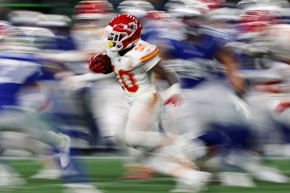 Emmett Johnson #10 of the Kansas City Chiefs runs against the Seattle Seahawks during the fourth quarter at Lumen Field in Seattle, Washington.