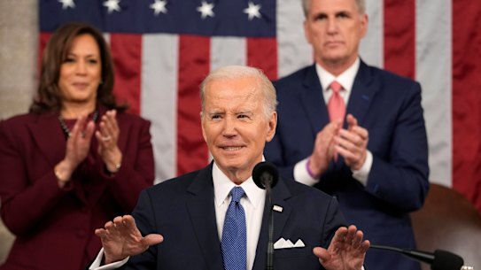 US President Joe Biden delivering his State of the Union address flanked by Vice President Kamala Harris and House Speaker Kevin McCarthy.