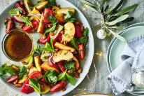 Julia Busuttil Nishimura’s heirloom tomato salad with peaches, mint and almonds.