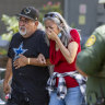 A woman cries as she leaves the Uvalde Civic Centre where families are waiting for news about their children.
