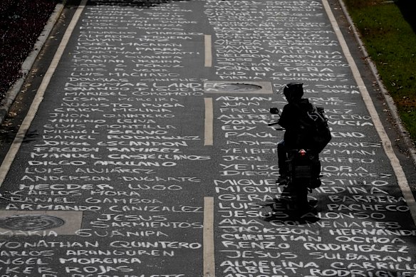 Names cover a street at the Central University of Venezuela in Caracas, Venezuela. Organisers of the painting said they painted it the previous day, and they are names of students who have died during anti-government protests since 2014.