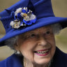 Queen cancels pre-Christmas lunch as Britain reports new daily record for COVID cases